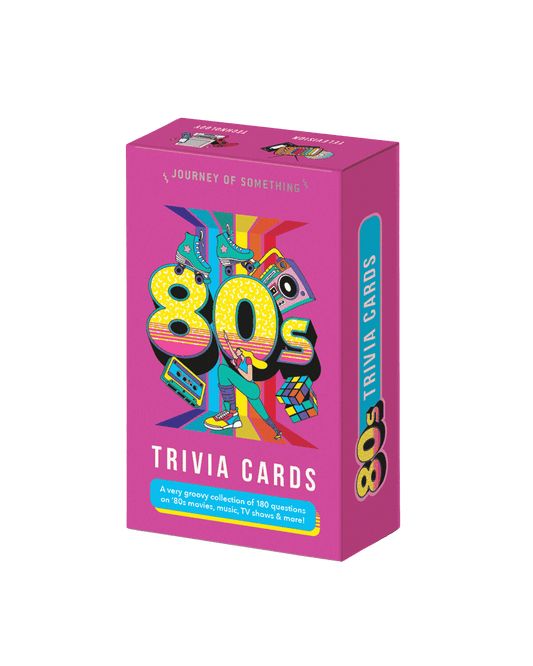 80's Trivia Cards by Journey of Something: A hot pink box with fun 80's inspired icons on the front and the numbers 80 in retro font. 