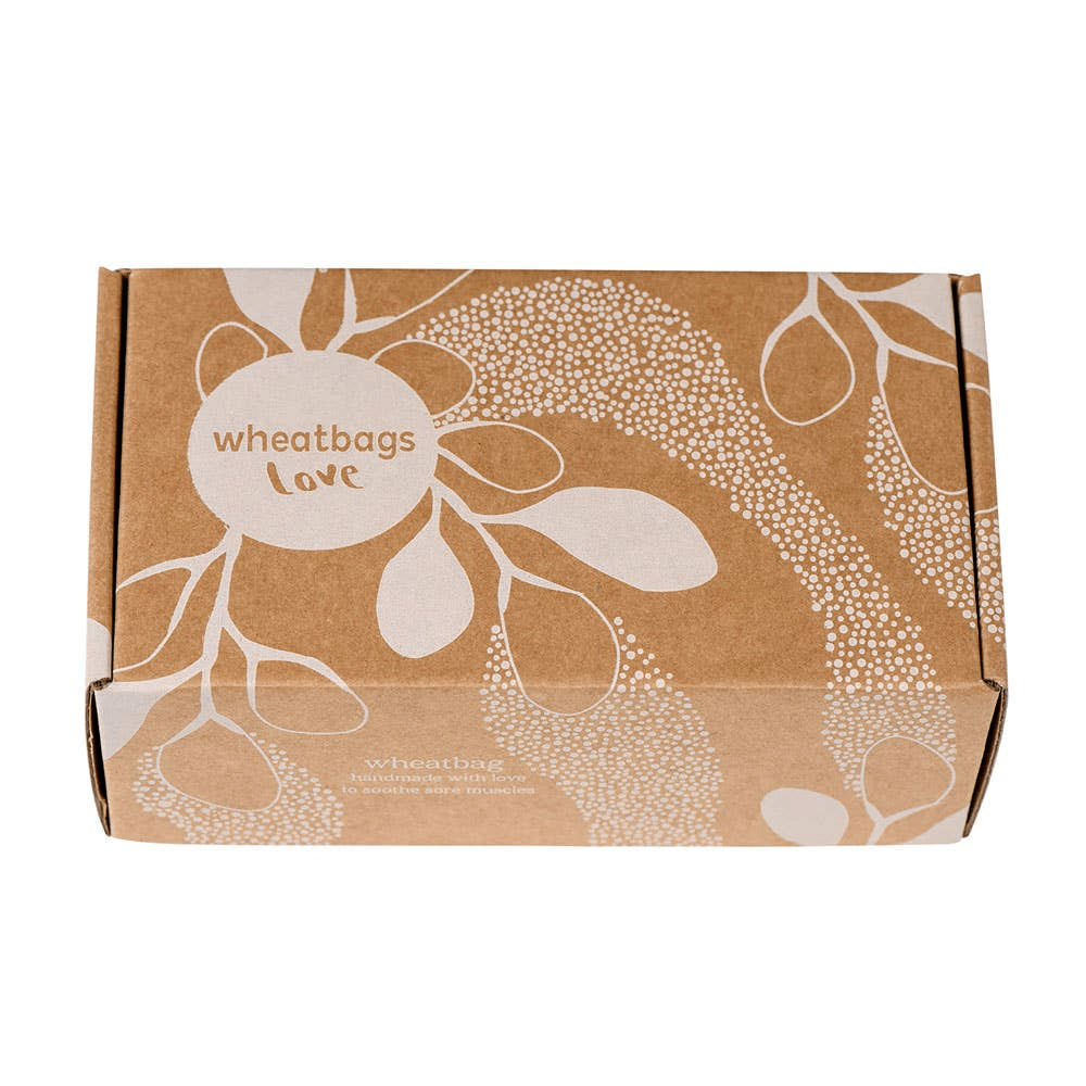 An image of the brown box Wheatbag Love's wheatbags come in. It features a silhouette of Australian gum leaves.   